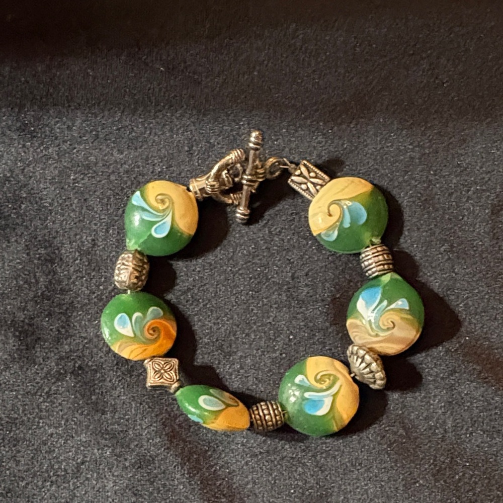 Green, yellow & blue hand painted beads w/ silver beads in between Bracelet 6.5”